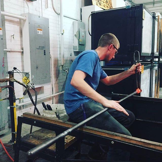 James Eddlestone in the hot shop blowing glass