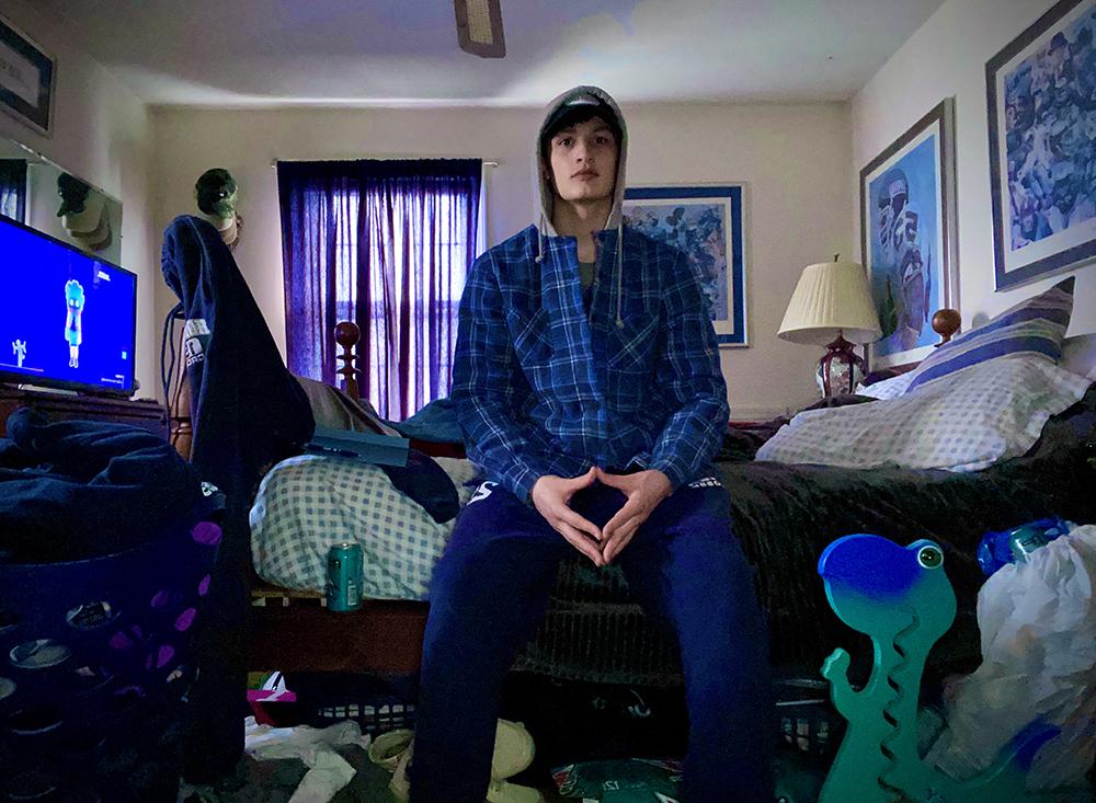 Joe Brady in his dorm room